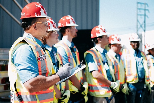Gama Safety mission – workers in hard hats and safety vests